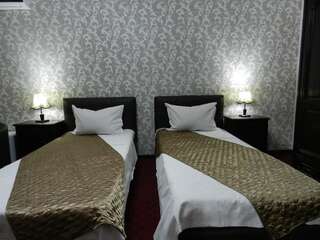 Отель Hotel Marinii Бухарест Двухместный номер с 2 отдельными кроватями-2